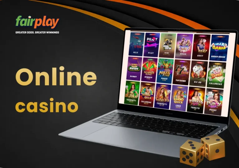 FairPlay casino lobby displayed on a laptop beside a pair of dice